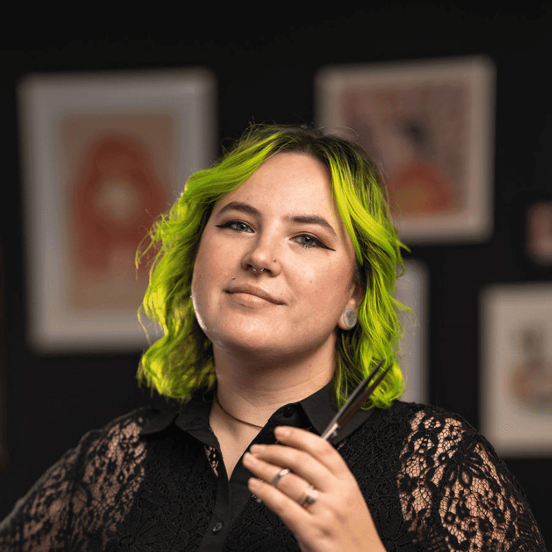 Portrait of Jessika (Jess) (She/Her), a professional stylist at Rebel Hair, showcasing their expertise and style.