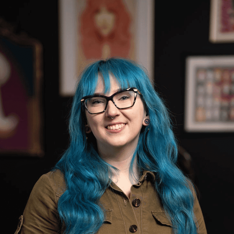 Portrait of Majestica (She/Her), a professional stylist at Rebel Hair, showcasing their expertise and style.